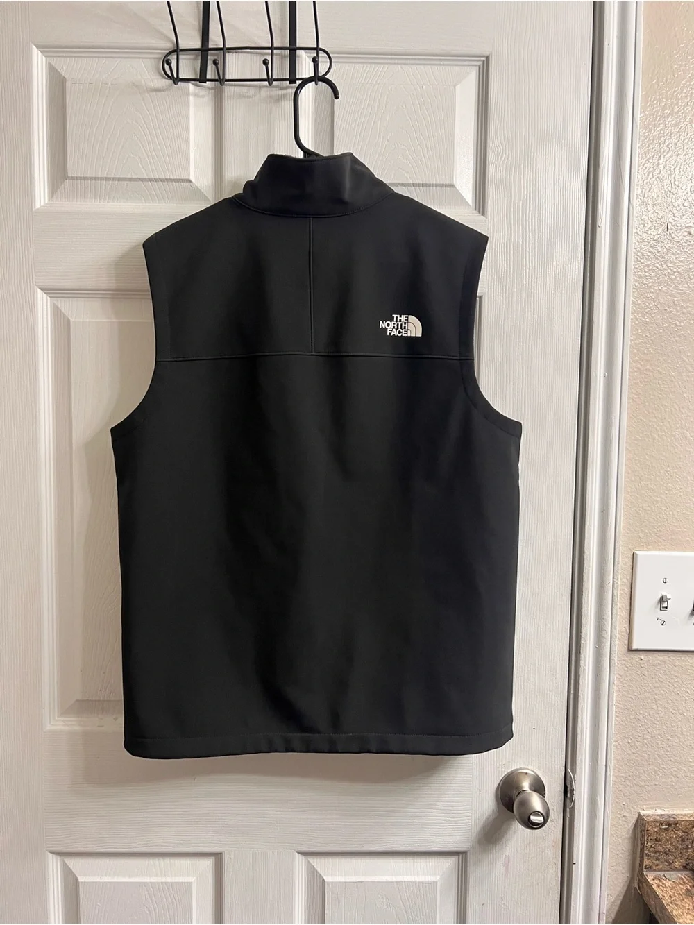 The North Face Black Men's Softshell Vest with Chest Zip Pocket